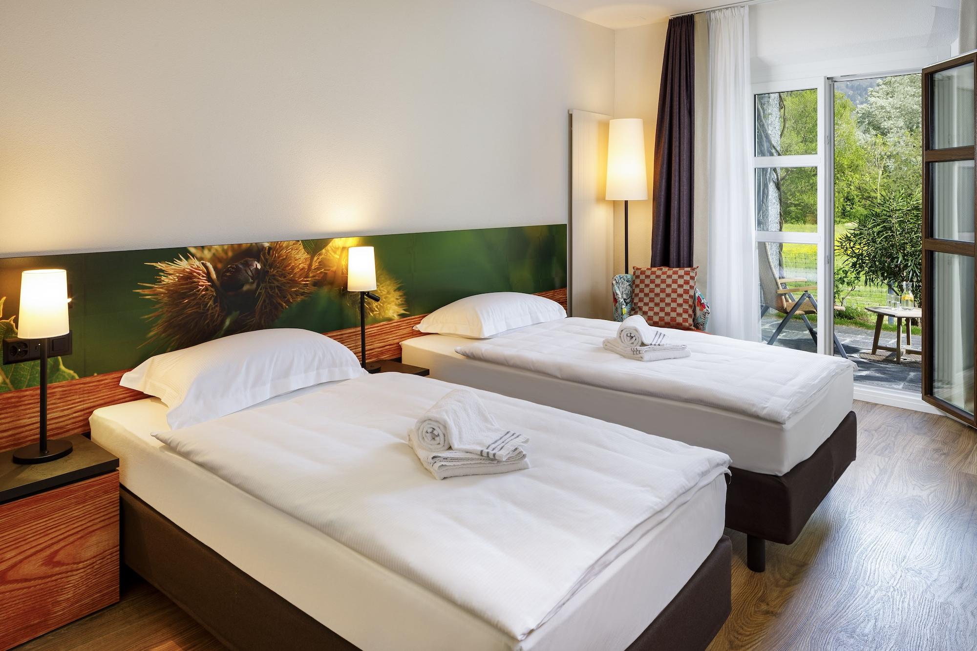 Hotel Bellinzona Sud Swiss Quality Монте-Карассо Экстерьер фото