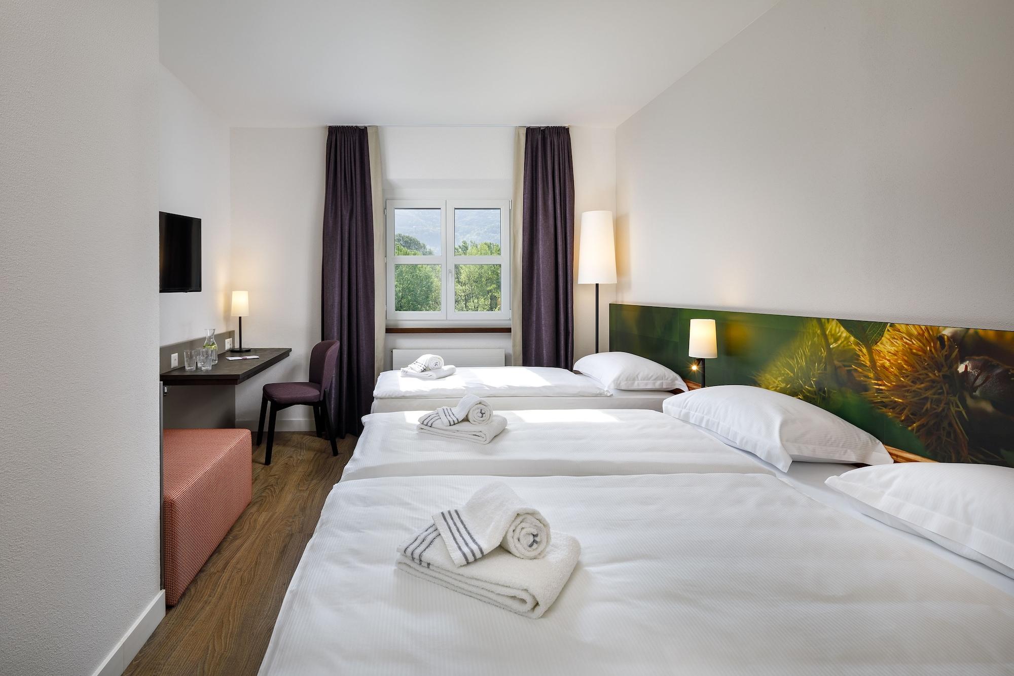 Hotel Bellinzona Sud Swiss Quality Монте-Карассо Экстерьер фото